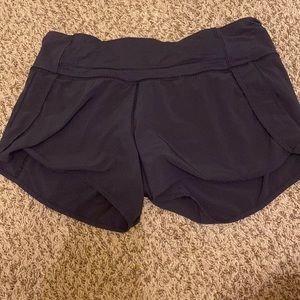 Navy Lululemon speed up 4 inch